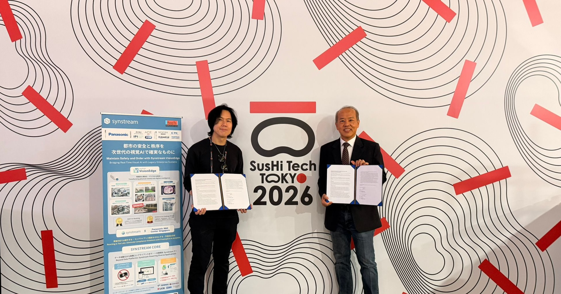 Roots Innovation and Panasonic R&D Center Singapore representatives signing a strategic MOU